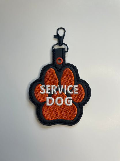 Orange Paw-Shaped Snap Tab – 4.25” x 3.5” Safety Tag for Vests, Collars & Leashes
