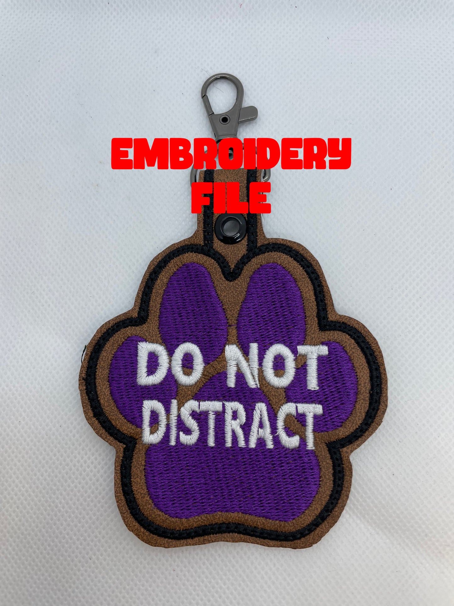 Do not distract Snap tab embroidery file
